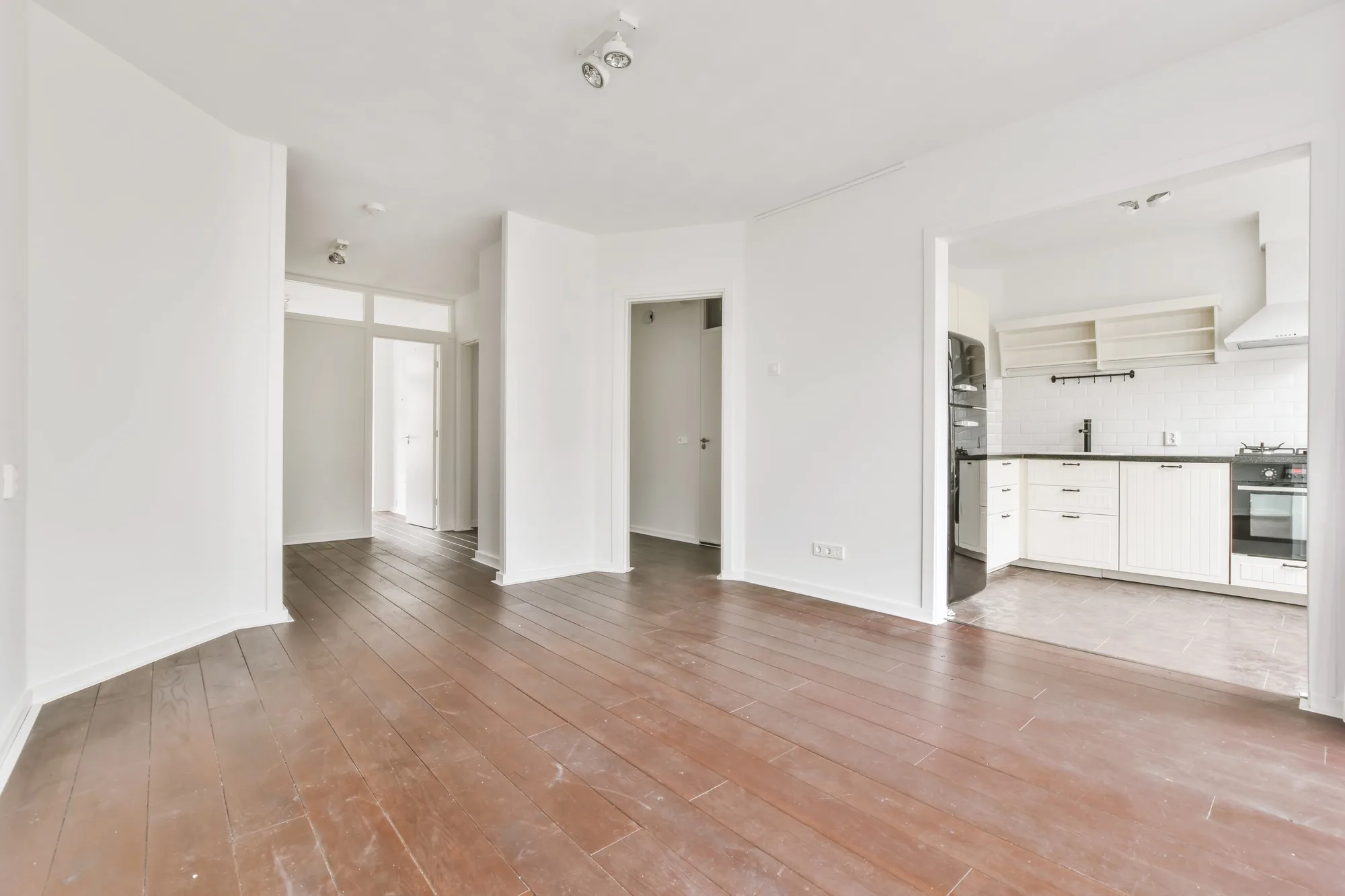 The interior of a stylish room with white walls